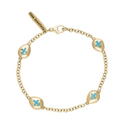 18ct Yellow Gold Turquoise Oval Fleur De Lis Detail Four Stone Bracelet